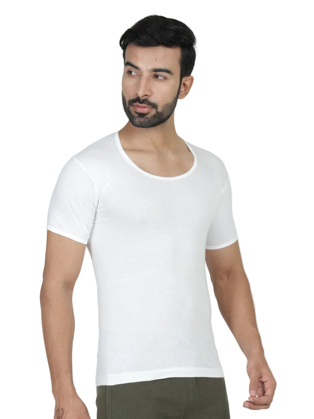 Man wearing a plain white t-shirt against a light gray background